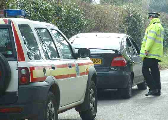 Sussex Police car and officer Hamer Lane morning raid