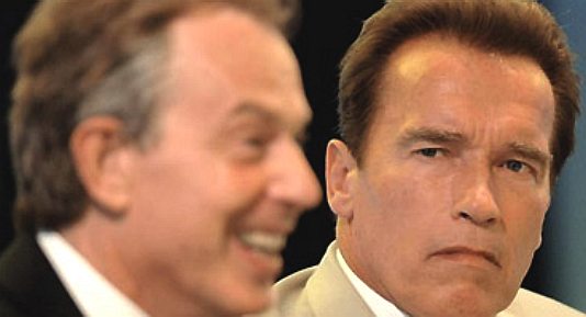 UK Prime Minister Tony Blair laughs as California Governor Arnold Schwarzenegger looks on.