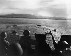 LCVP landing craft circle while awaiting landing orders during the invasion of Cape Torokina, Bougainville, 1 November 1943