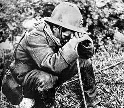 French soldier weeping after the Battle of France, May 1940.